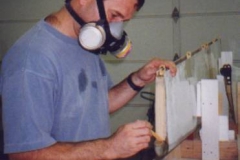 Finished attaching and forming the horizontal stabilizer tips. The inboard sides of the elevator counterweight arms were capped, bonded, and sealed (between the cap and shearweb). I often wear this respirator to keep my protective glasses from fogging. (A major problem when wearing the lightweight dust masks) This mask is so lightweight, I don't even realize I have it on after a while.