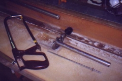 Hacksaw and tube cutter used to adjust length of vision fuel probe. End of fuel probe was sanded to remove burrs. After cut, plastic support for internal rod was 1 from end and did not require any further modification.