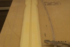 I finished cutting and sanding the foam to fit the fuselage seam area. I also cut a channel for the conduit that will carry any overhead wiring I might install. This is a photo of the channel without the conduit.