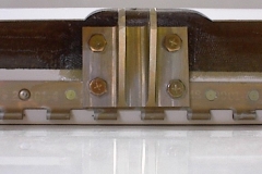 Finished flap laminations. Bonded flap stop webs to rear spar. Cut clearance holes in flaps and rear spar for flap actuators. Installed flap actuators and fabricated flap actuator rods. Alumaprepped and alodined flap actuator fittings and flap stop angles. Reinstalled flap actuator fittings.