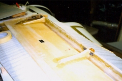 Laminated elevator foam ribs. Installed nutplates for elevator hinges and installed hinges. Trimmed rib laminates in preparation for closing the elevators.