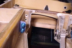 Fabricated and installed the hydraulic line union fitting angles. Fabricated the strut door linkage brackets.