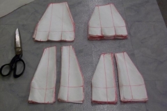 Finished cutting 96 cloths that are laminated on the inner and outer side of the engine mount gussets.