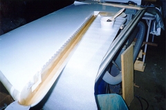 Laminated shearweb to left rudder half.