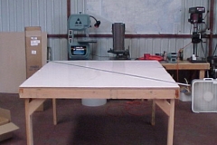 A simple 5 foot by 5 foot cloth cutting table