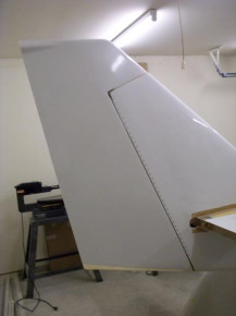 Riveted the hinge to the vertical fin and the rudder shearweb. This photo was taken after I finished all the riveting.