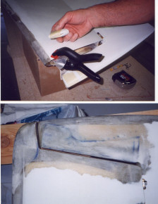 Manufactured horizontal stabilizer tips. The molded stabilizer tips had to be split with a saw and laminated closed on the ends to get the correct shape (see tape holding shape while curing). Then a two layer laminate (see clamp) was bonded to the inside of the end of the horizontal stabilizer to give a stable surface to hold the tip for additional inside laminates. Stabilizer tips were laminated to horizontal stabilizer. Elevator counterweight arms were laminated on the inside. These are very difficult laminates. The opening is very tight and the glass wants to stick to everything. Finally applied pre-preg layers to a folded piece of thin cardboard. Then slipped the cardboard in the small opening and used a skinny stick to hold the laminates in place while I pulled the card board out. Then used a small brush on a stick to finish the job. Make sure you sand the inside BEFORE you close the elevator. (See inside of tip in picture 4/28/99)