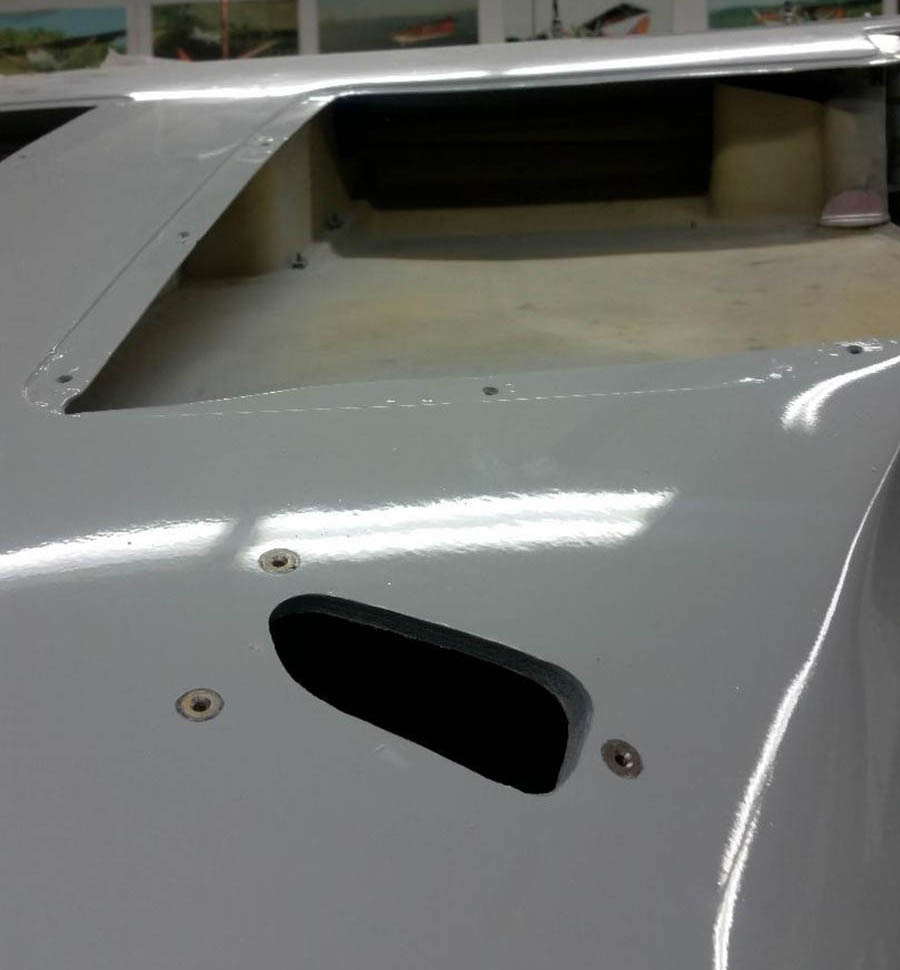 The longer Sportsman flap tracks require relief holes in the fuselage, covered with both an exterior .050” thick aluminum cover plate plus a cosmetic .020” thick interior one. 